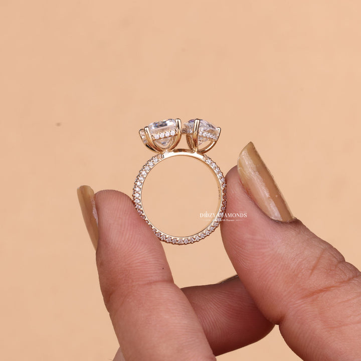 Pear pave engagement ring with brilliant diamond sparkle