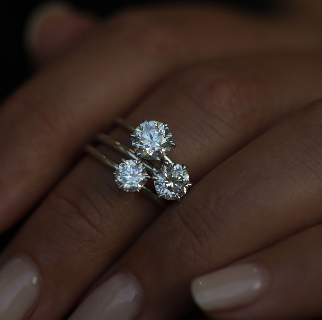 Round solitaire engagement ring finished in polished solid gold