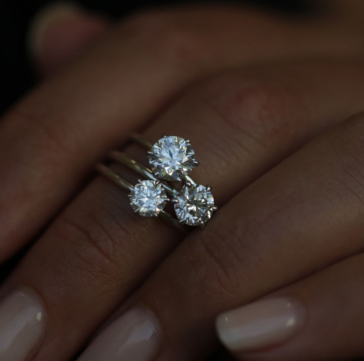 Round solitaire engagement ring finished in polished solid gold