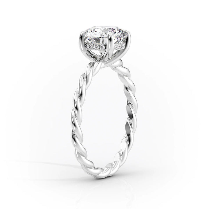 Classic oval hidden halo engagement ring crafted for everyday wear