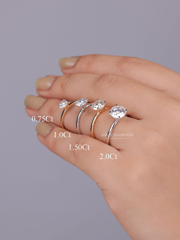 Close-up of round cut center diamond in solitaire engagement ring