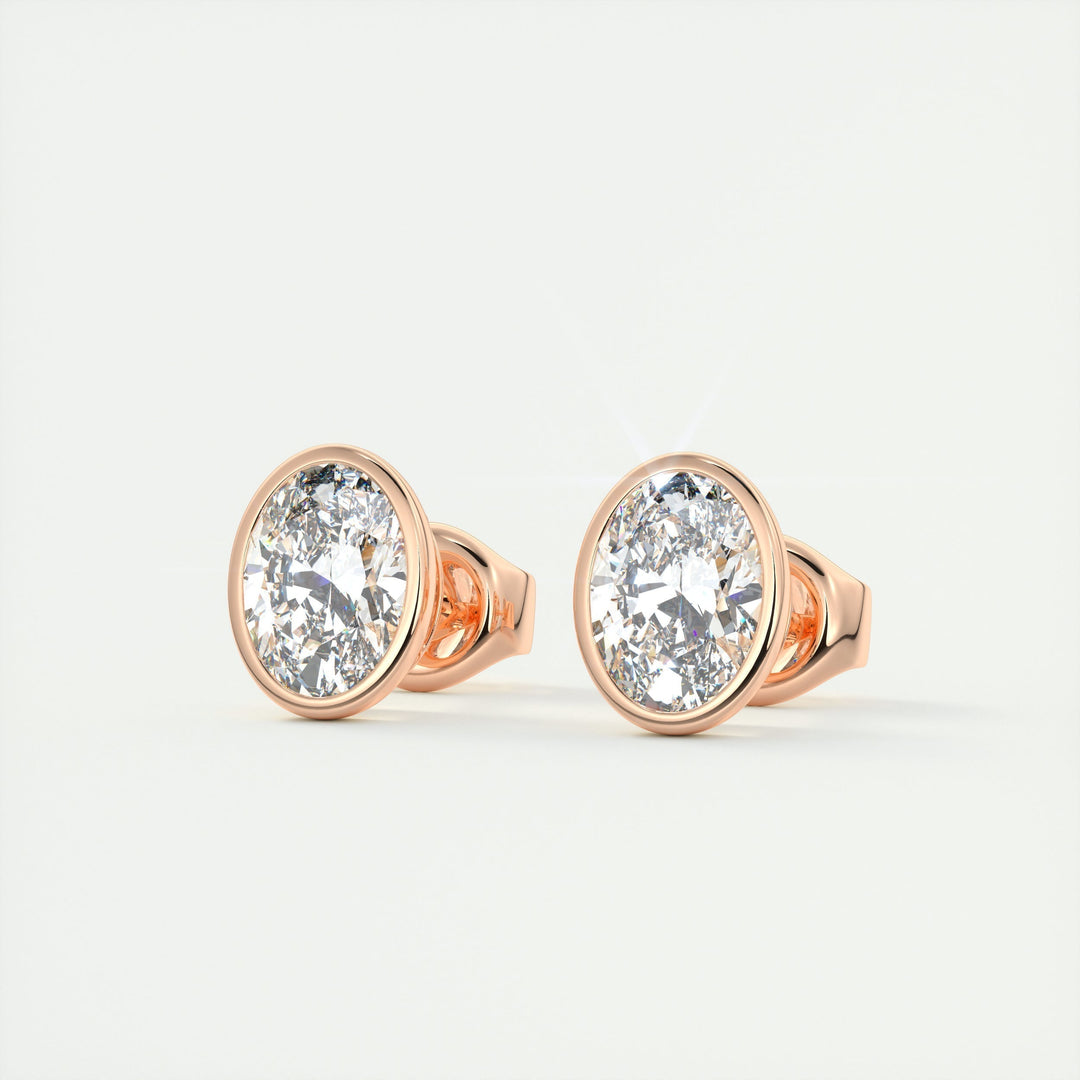 1-0-ct-oval-bezel-solitaire-cvd-f-vs-diamond-earrings