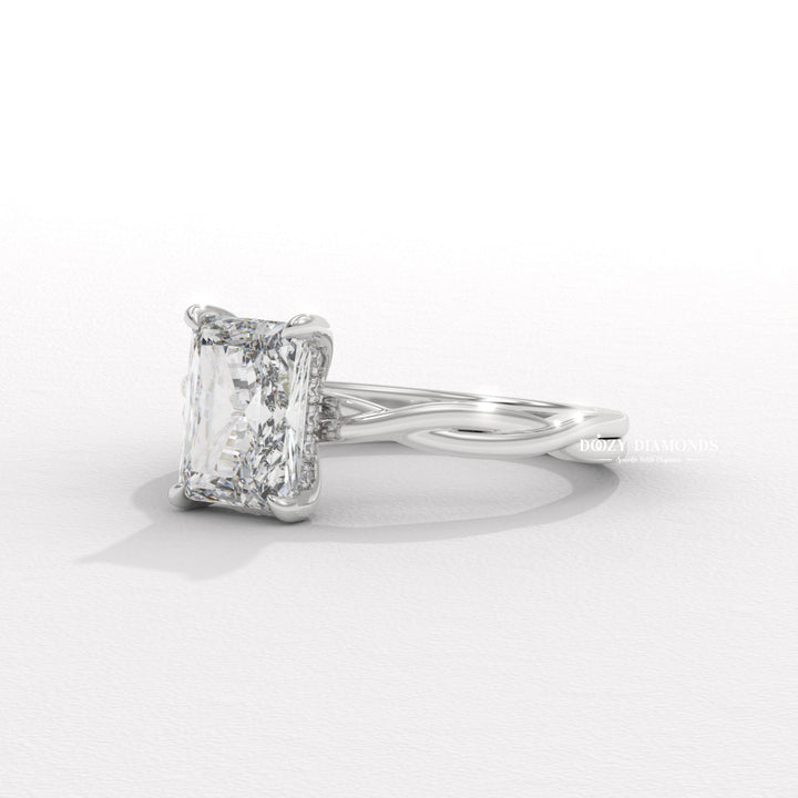 Radiant solitaire engagement ring photographed in natural light