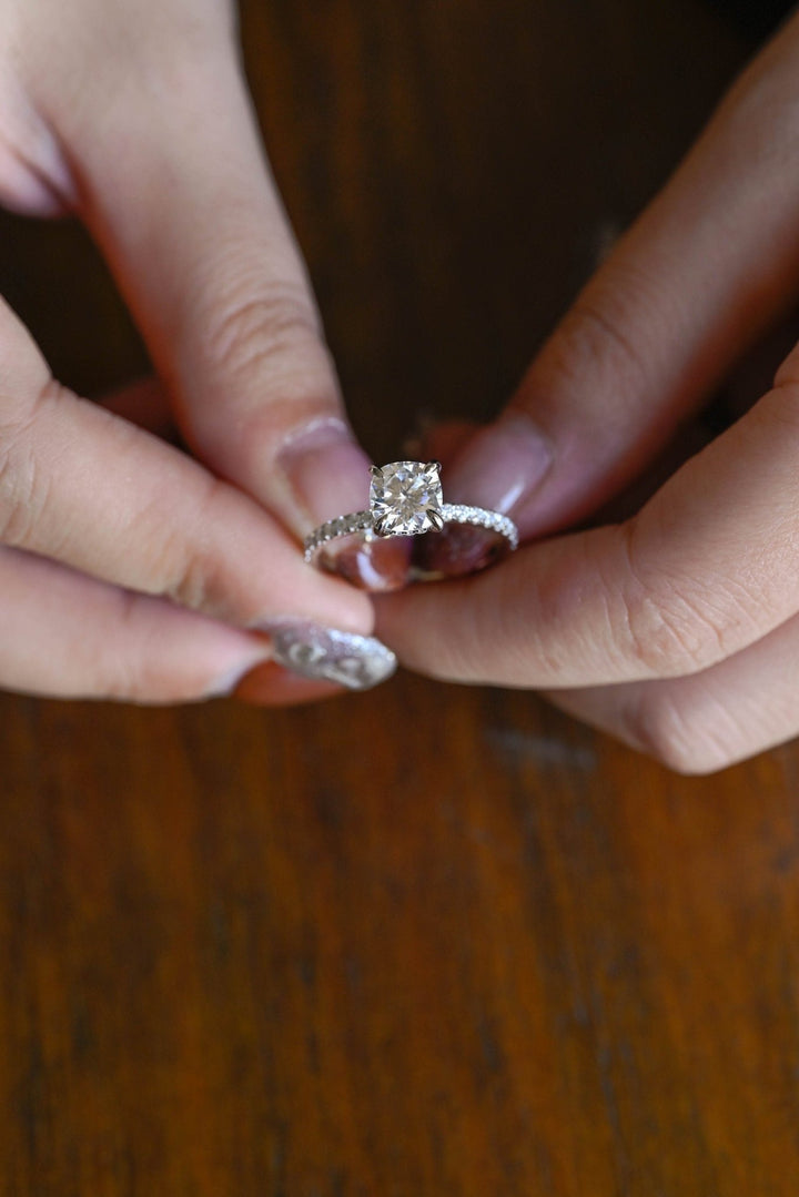Round hidden halo lab grown diamond ring side profile in gold setting