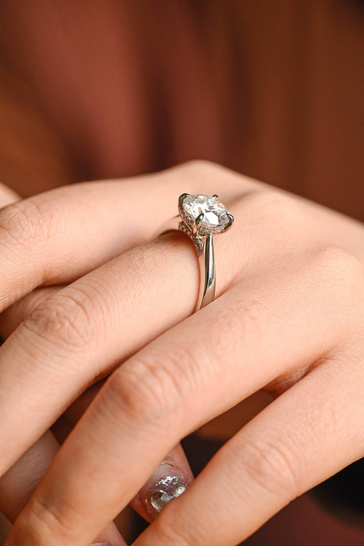 Round hidden halo engagement ring with IGI certificate and packaging