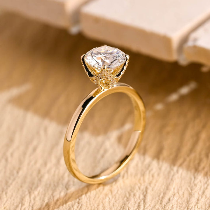 Unboxing view of round cut hidden halo diamond engagement ring