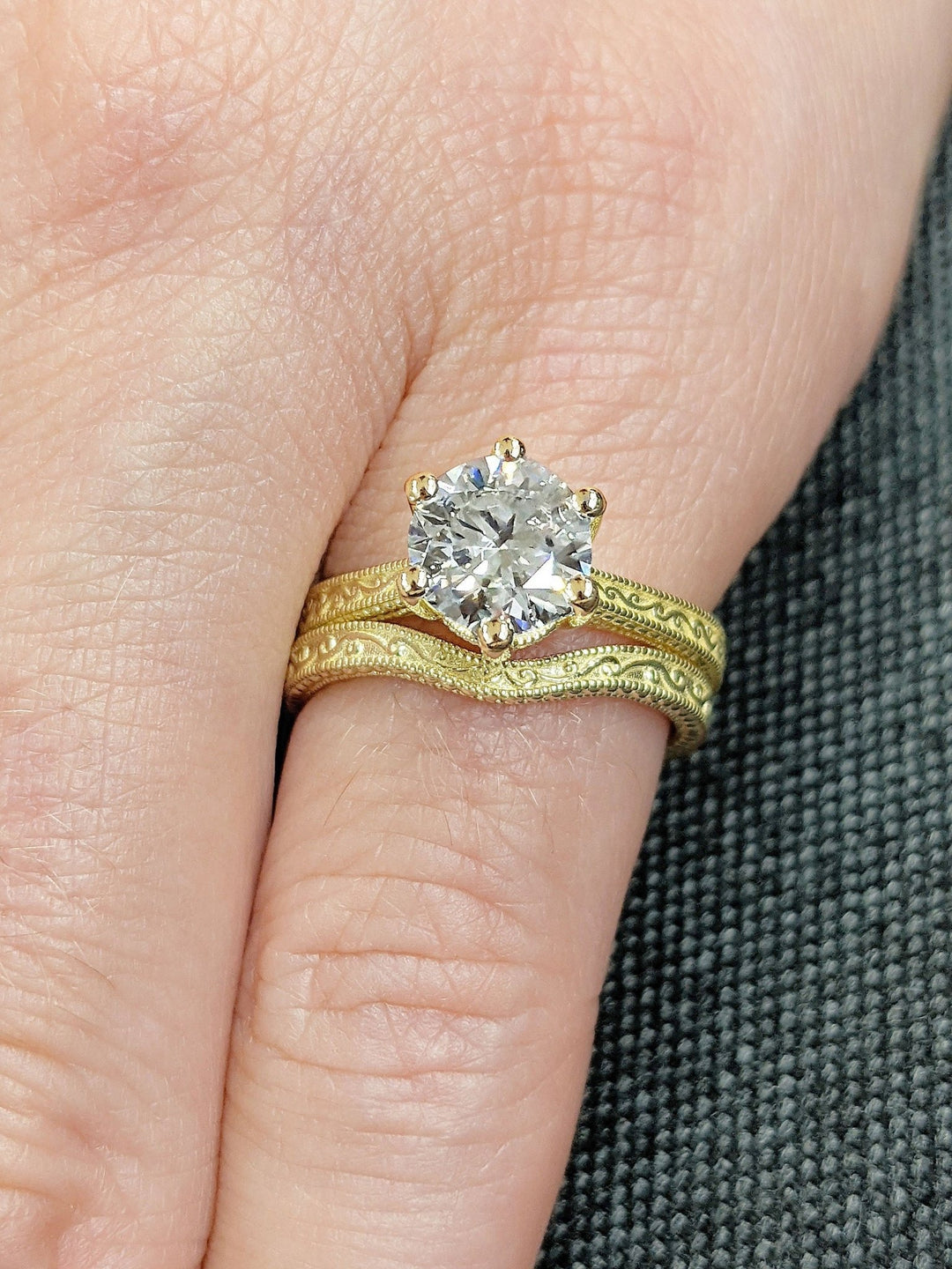Round vintage engagement ring viewed from the side