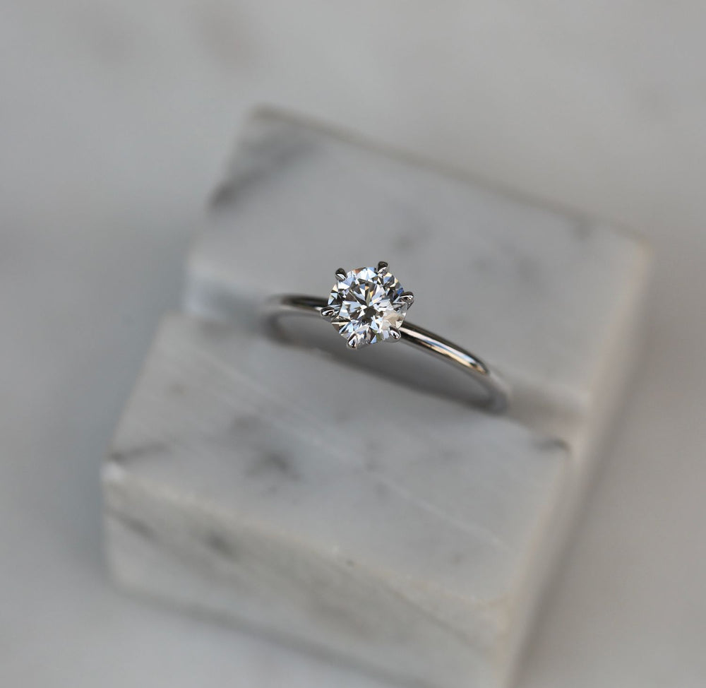 Shop the round cut solitaire engagement ring collection online