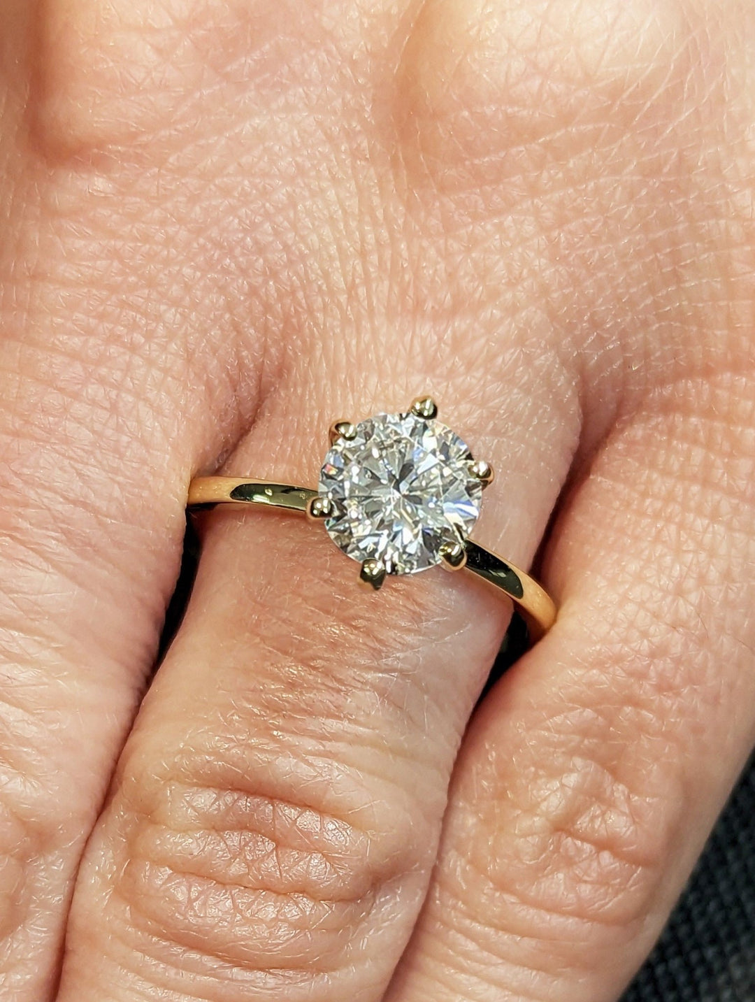 Round solitaire lab grown diamond ring in jewelry gift box