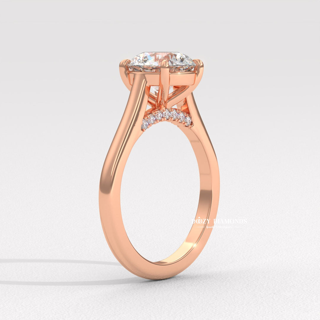 Profile view of round cut solitaire engagement ring band
