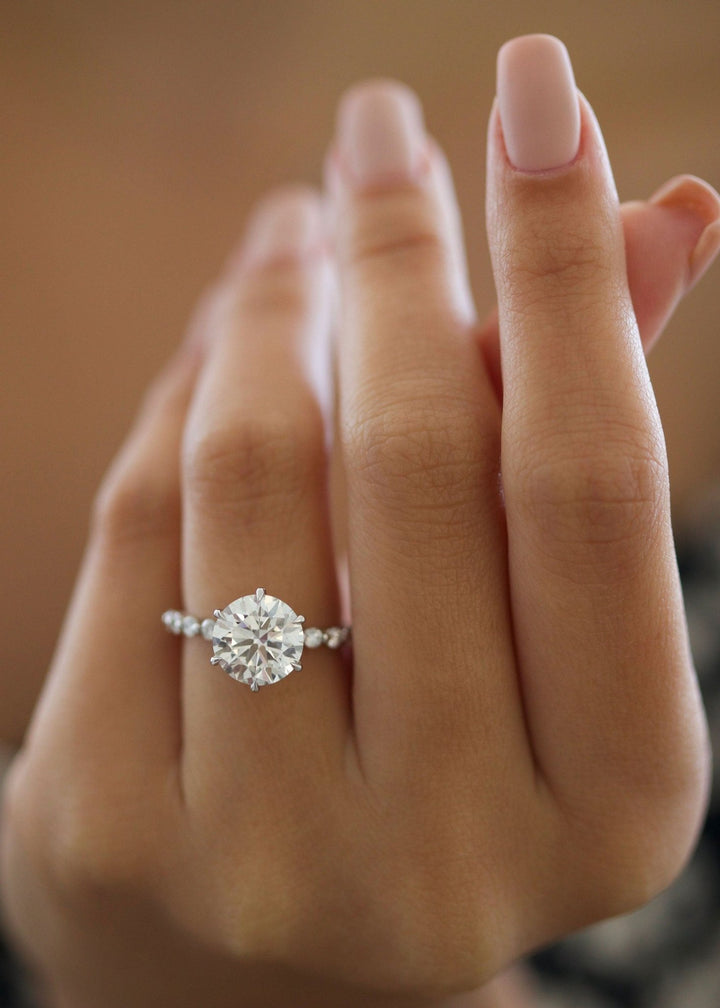 Shop the round cut pave engagement ring collection online