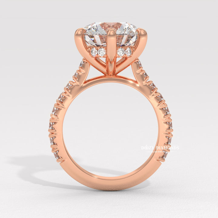 Unboxing view of round cut hidden halo diamond engagement ring