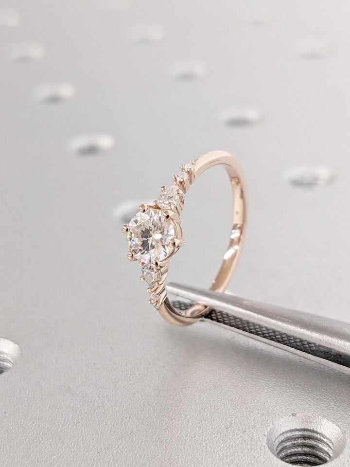Round cluster engagement ring with brilliant diamond sparkle