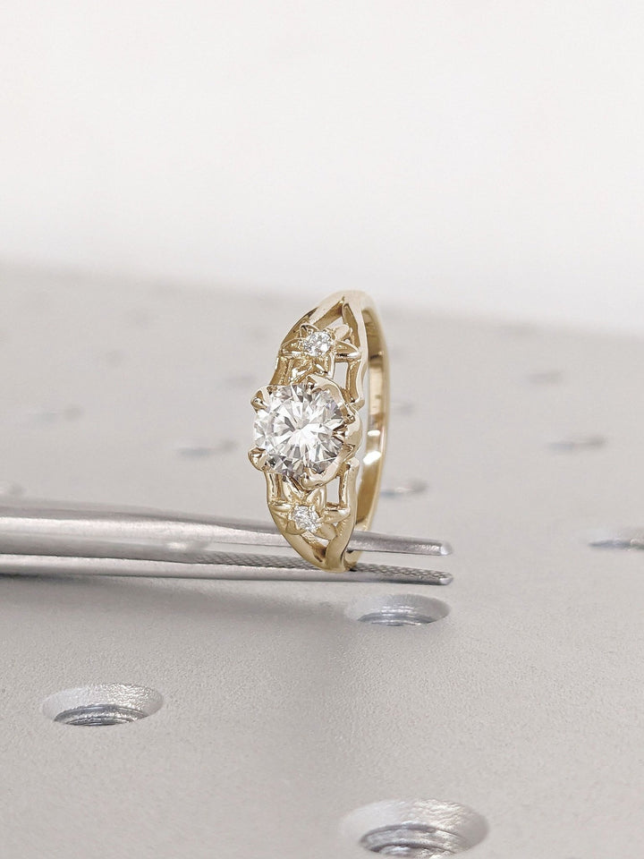 Unboxing view of round cut solitaire diamond engagement ring
