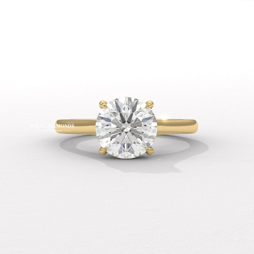 Round cut solitaire engagement ring available to buy now