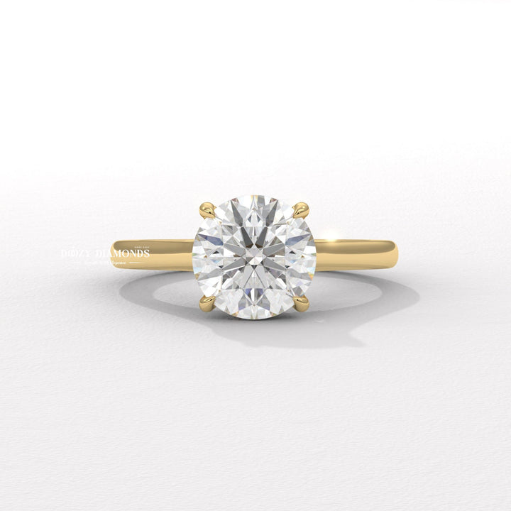 Round cut solitaire engagement ring available to buy now