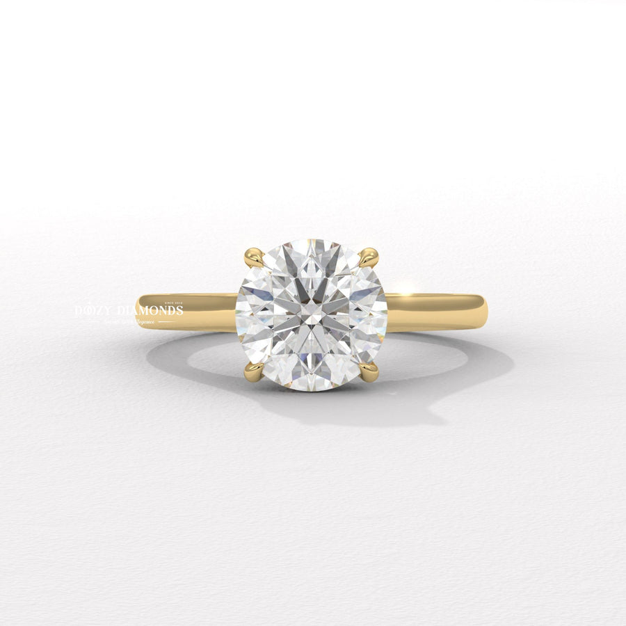 Round cut solitaire engagement ring available to buy now
