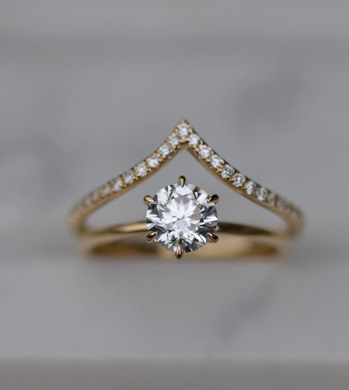 Classic round solitaire engagement ring crafted for everyday wear