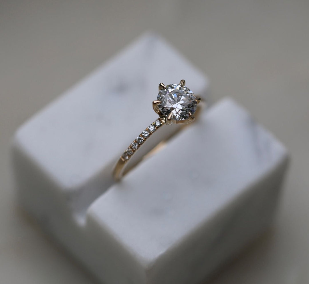 Classic round solitaire engagement ring crafted for everyday wear
