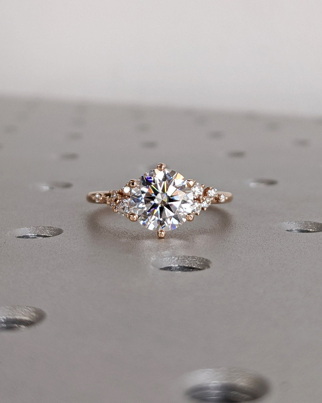 Side angle of round cluster diamond engagement ring