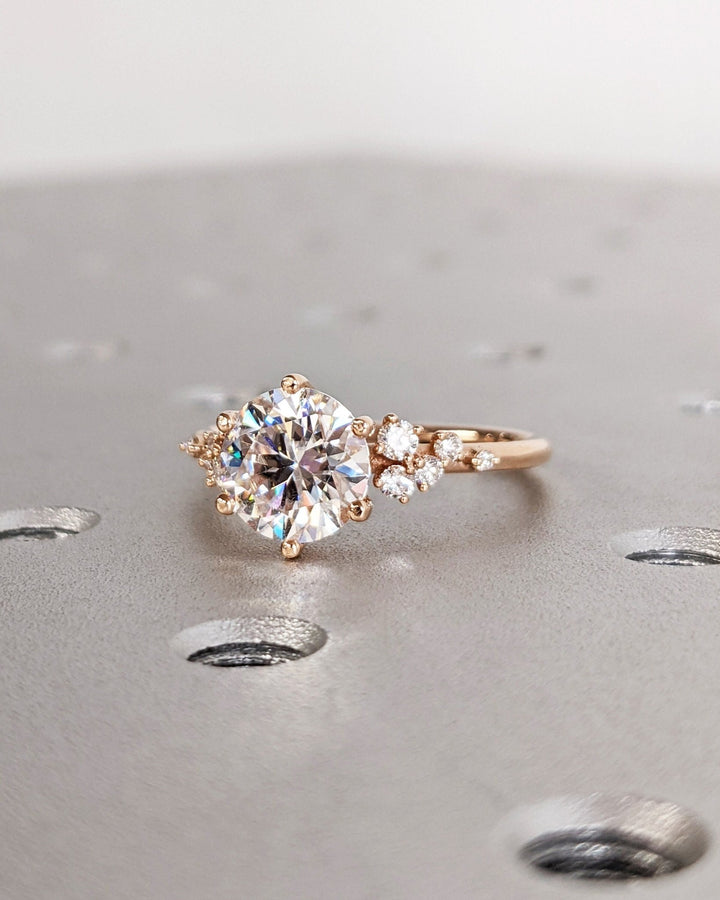 Round cut diamond ring worn on hand