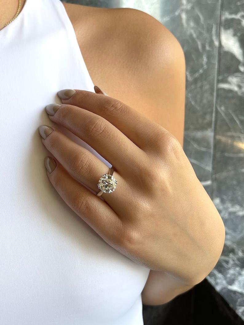 Classic round solitaire engagement ring crafted for everyday wear