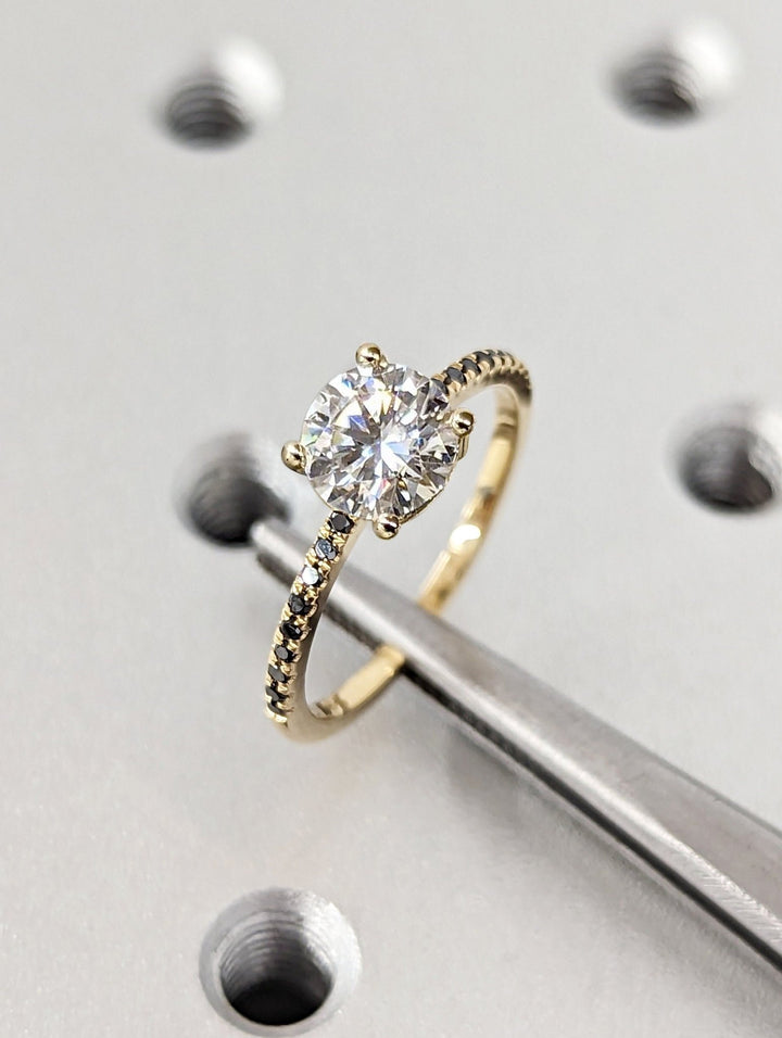 Round pave engagement ring with IGI certificate and packaging