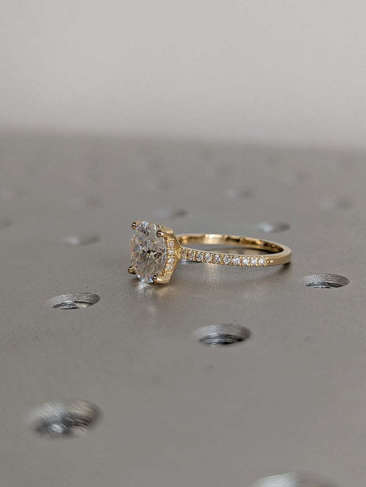 Round hidden halo lab grown diamond ring side profile in gold setting