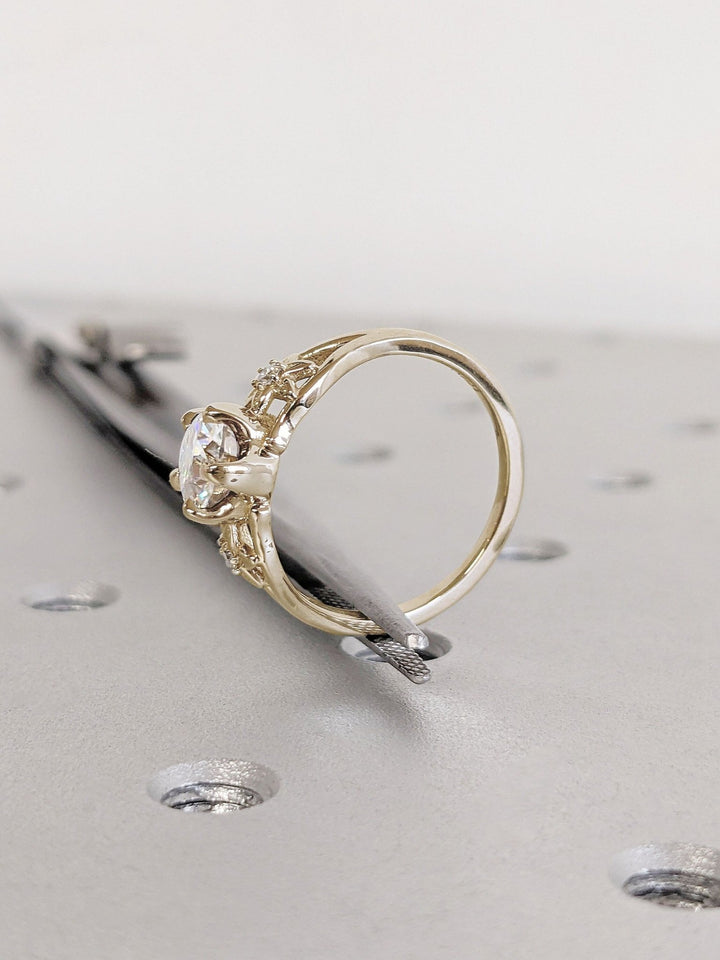 Round solitaire diamond ring presented in signature gift packaging