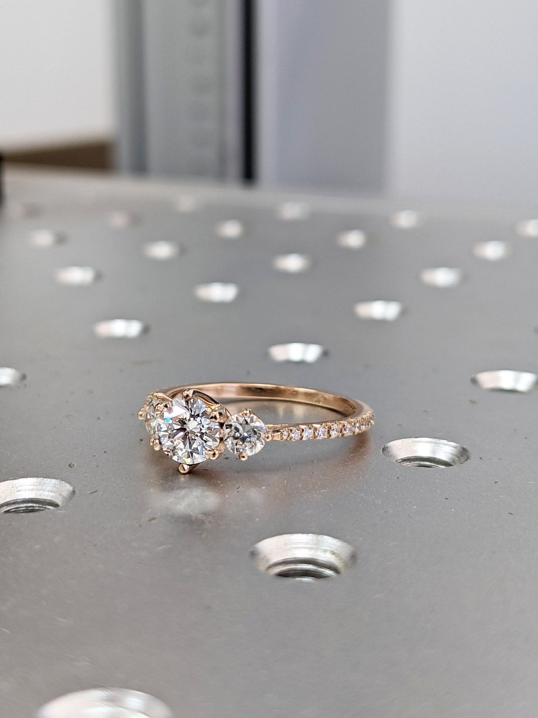 Round cut diamond ring worn on hand