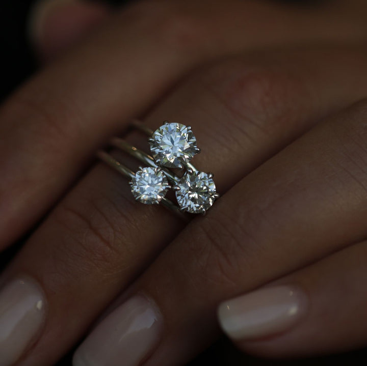 Round solitaire engagement ring with IGI certificate and packaging