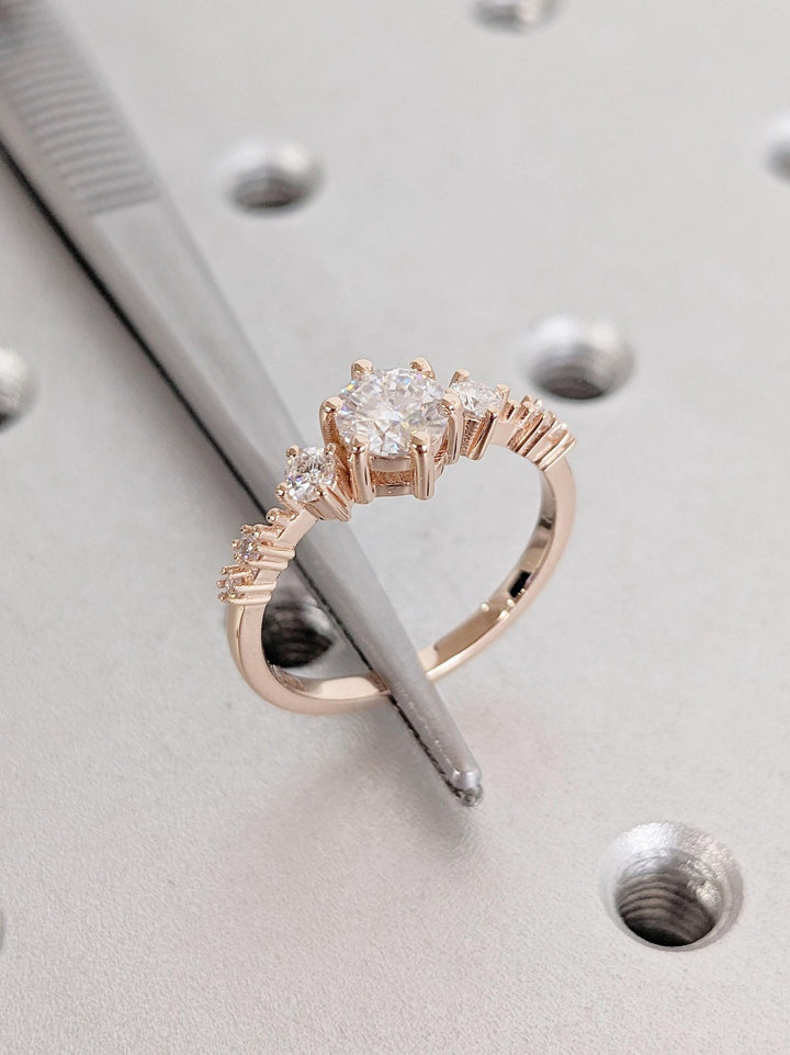 Fine craftsmanship detail on round cluster engagement ring