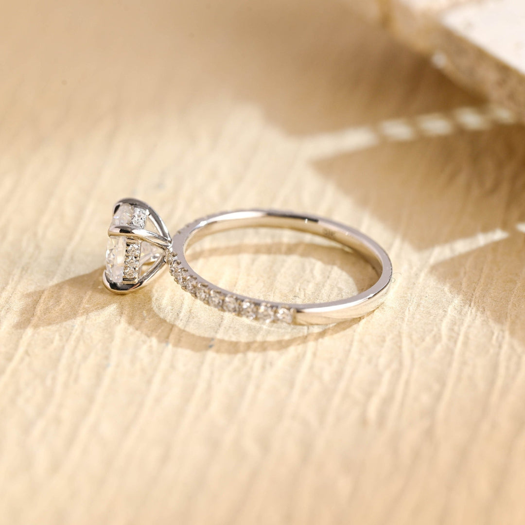 Macro shot of round cut diamond facets in hidden halo ring setting