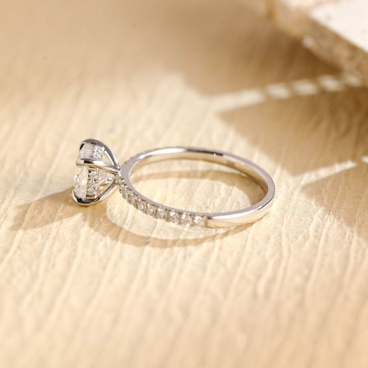 Macro shot of round cut diamond facets in hidden halo ring setting