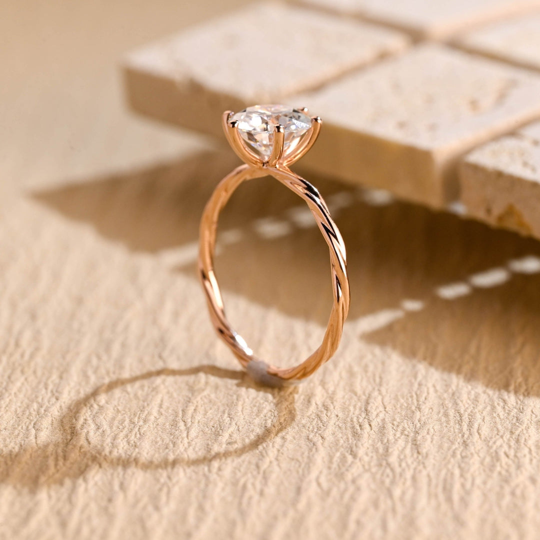 IGI certified round cut diamond in solitaire engagement ring setting