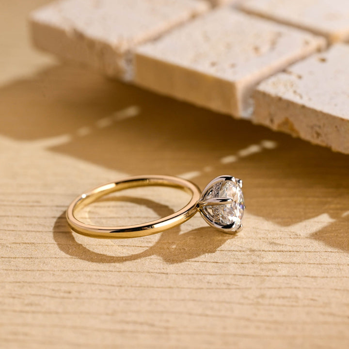 Classic round hidden halo engagement ring crafted for everyday wear