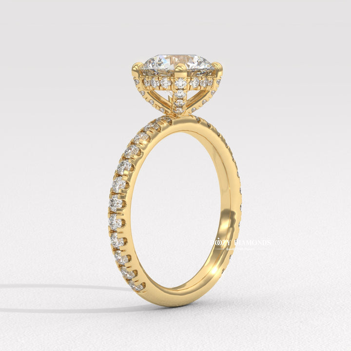 Premium round cut hidden halo engagement ring crafted in solid gold