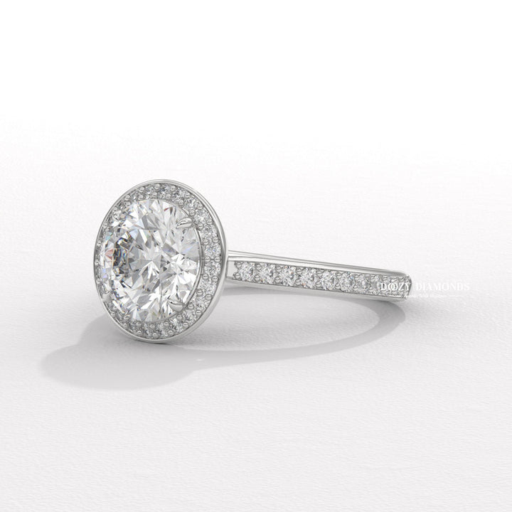 Round cut engagement ring shown with authenticity certificate