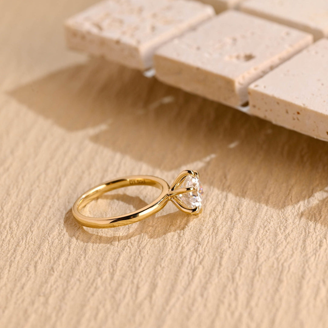 Premium round cut solitaire engagement ring crafted in solid gold