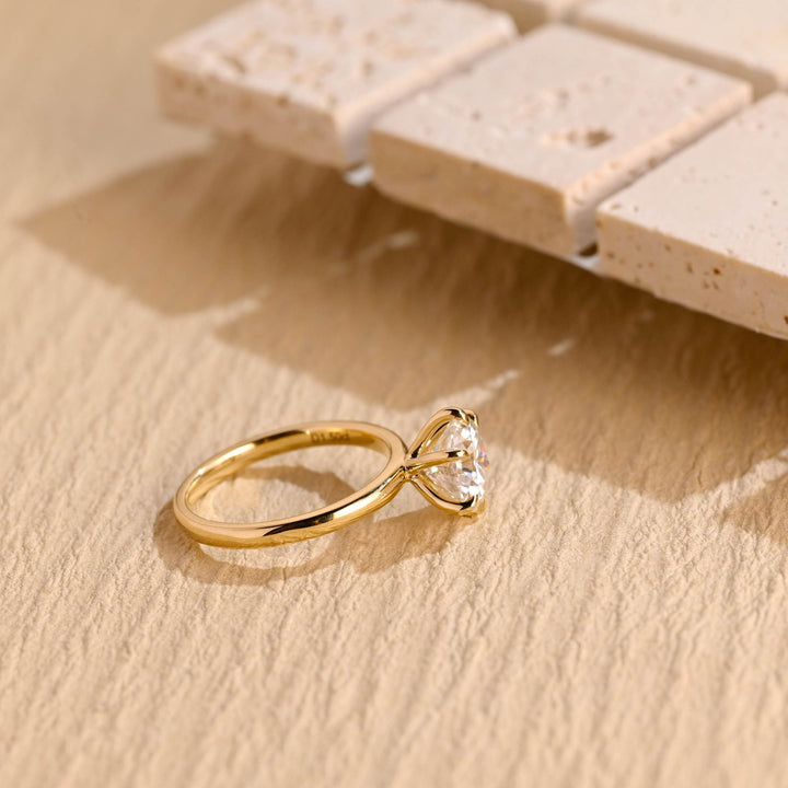 Premium round cut solitaire engagement ring crafted in solid gold