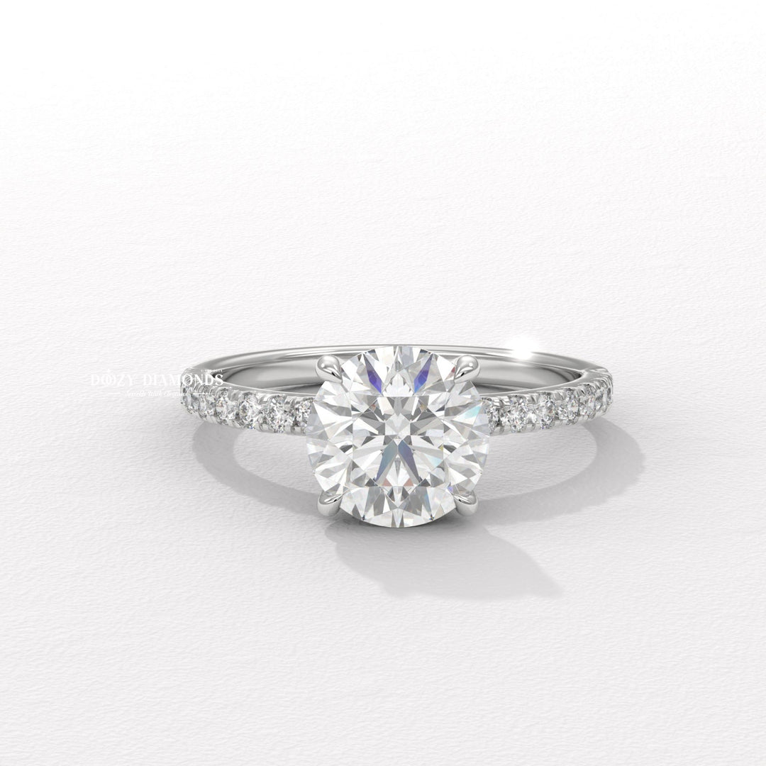 Round pave engagement ring close-up highlighting diamond sparkle