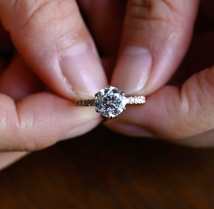 Side angle of round pave diamond engagement ring