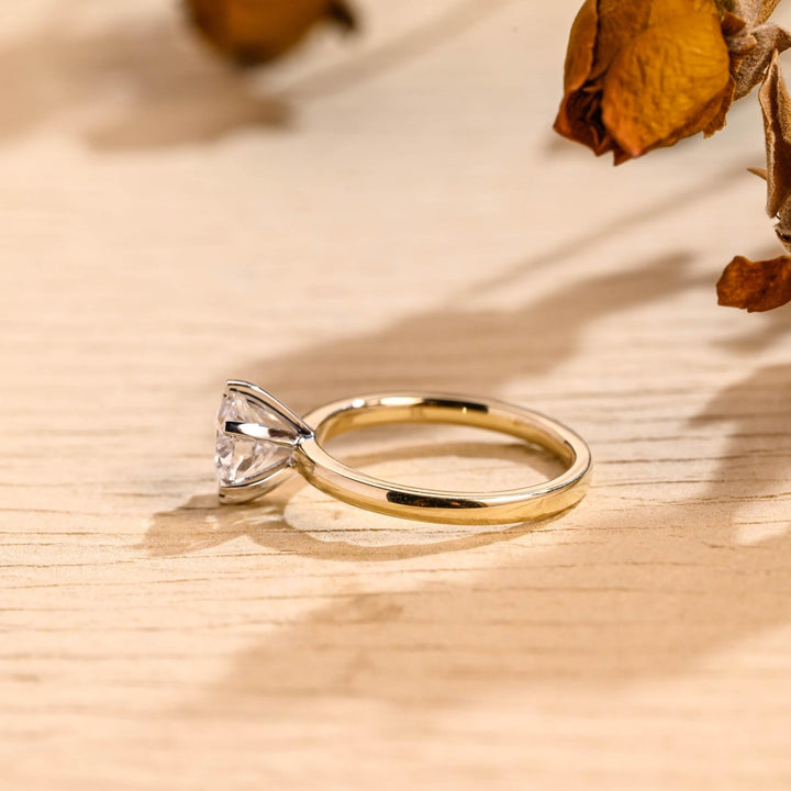 Shop the round cut solitaire engagement ring collection online