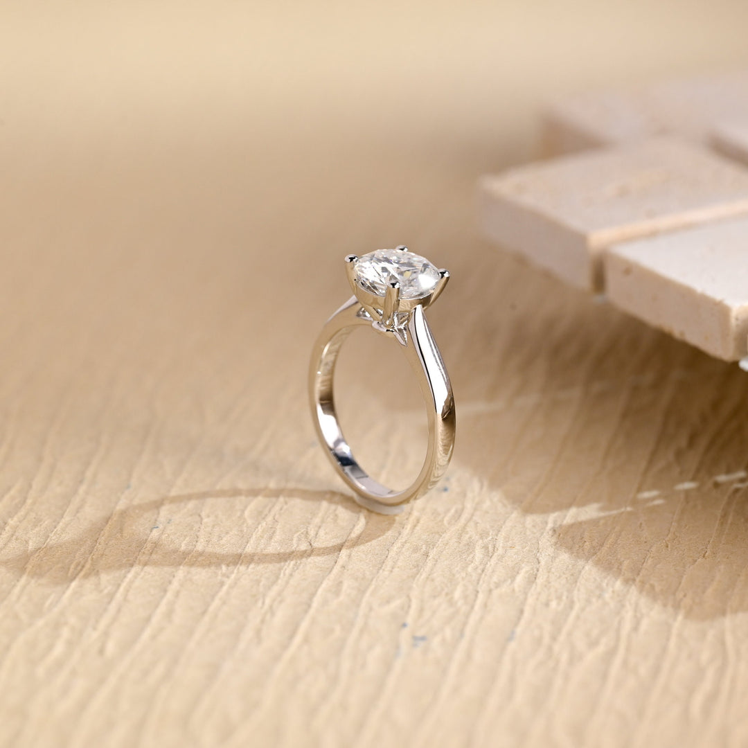 Fine craftsmanship detail on round solitaire engagement ring