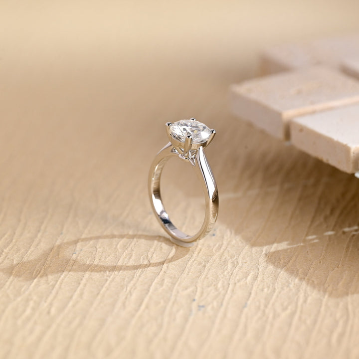 Fine craftsmanship detail on round solitaire engagement ring