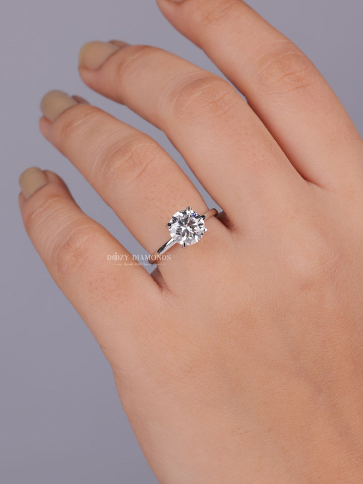 Round solitaire lab grown diamond ring side profile in gold setting