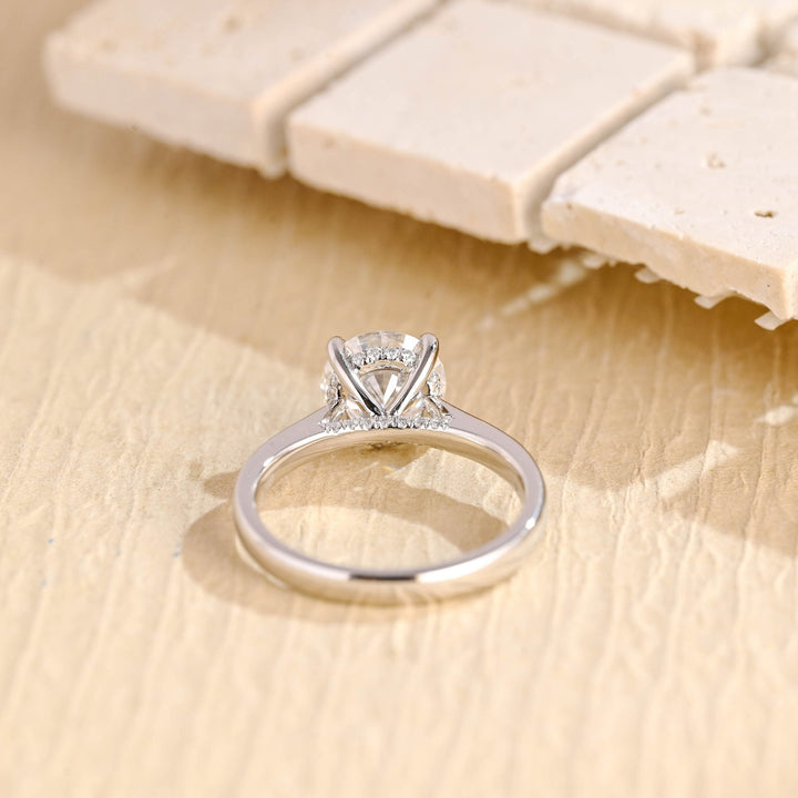 Shop the round cut hidden halo engagement ring collection online