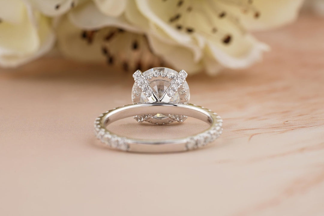 Round hidden halo lab grown diamond ring side profile in gold setting