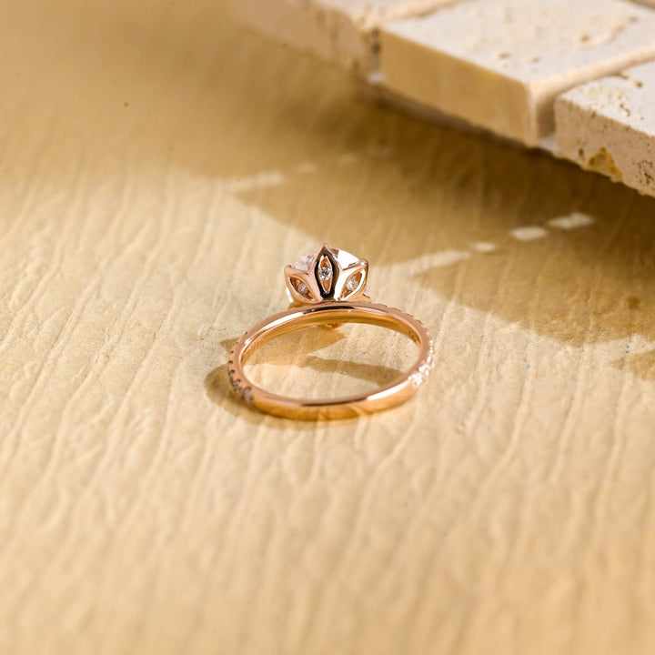 Round cut engagement ring side view showing band detail