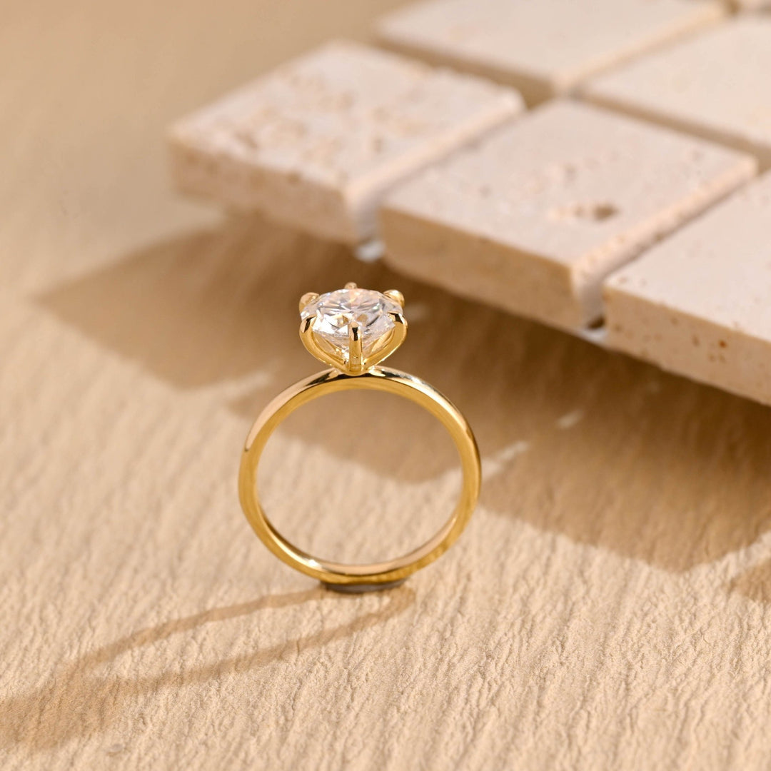 Fine craftsmanship detail on round solitaire engagement ring
